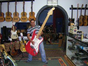 Leo with a big guitar