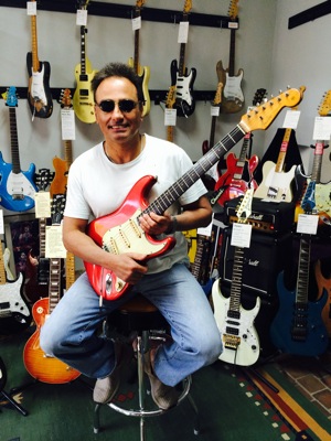 Leo with a big guitar